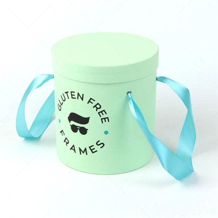 Шляпная зелёная коробка с крышкой для бутика эксклюзивной оптики картинка 1