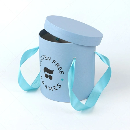 Круглая коробка голубая с крышкой и ручками лентами для бутика эксклюзивной оптики   картинка 1