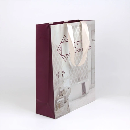 Бумажный пакет для магазина керамики c офсетной печатью и ручками-лентами